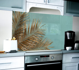 panel szkllany zlote liscie palmy na turkusowym tle